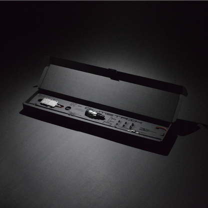 OILMETRIC Moniteur d'huile D2 pour prise de bord en argent titane dans un emballage noble ouvert